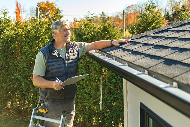 Professional Hail Damage Roof Repair technician working in Arlington, OR